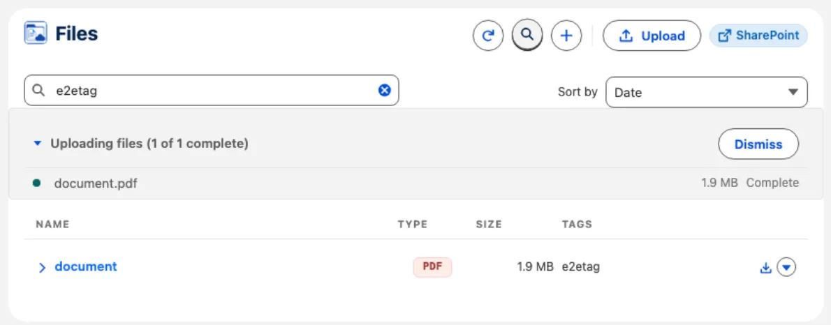 The Sliick Files component on a record: file list with tag search, sort, type and size columns, upload progress, and a SharePoint storage button